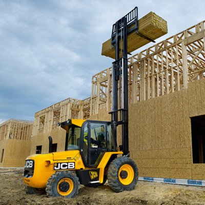 Forklift unloading machinery and industrial equipment in Wembley